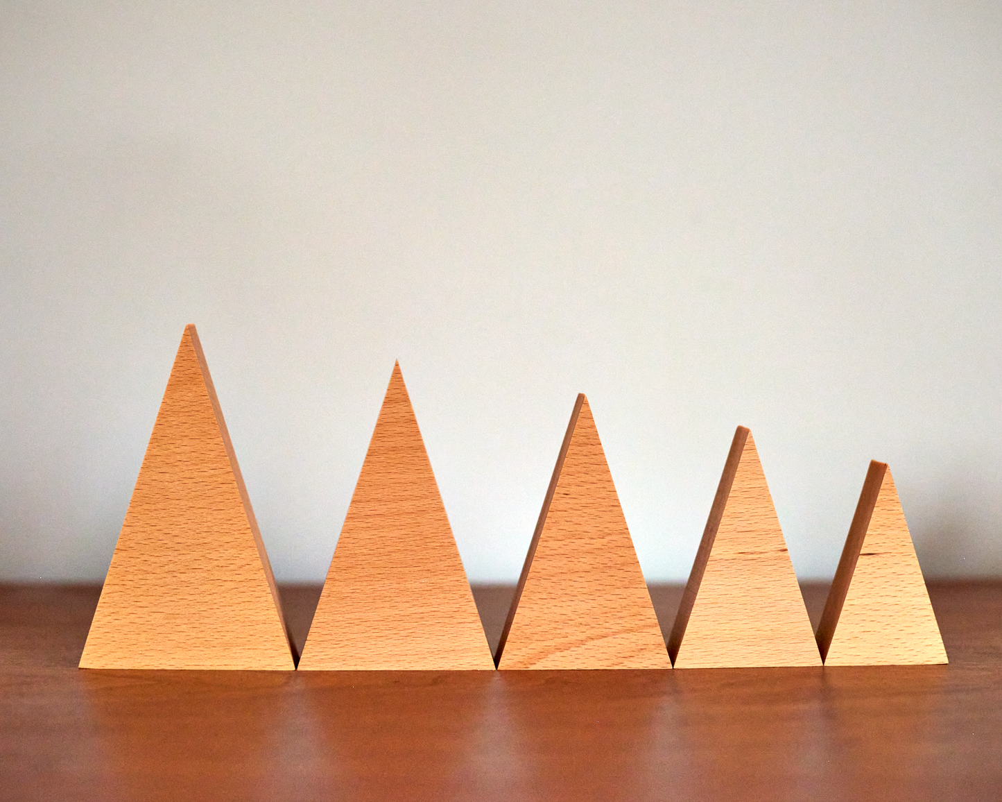 collection of tree family decorations in available sizes in Solid European Beech