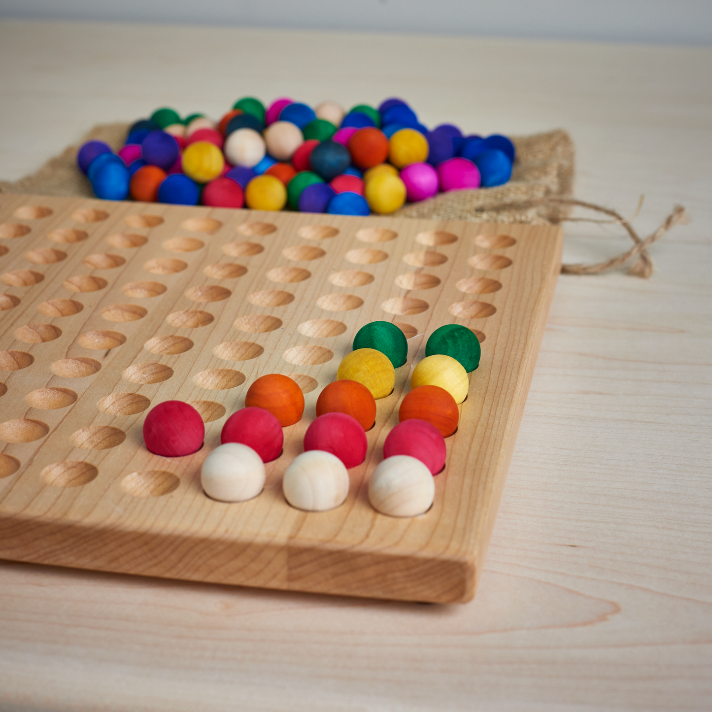 Hand made solid maple 100 board with 100 coloured balls