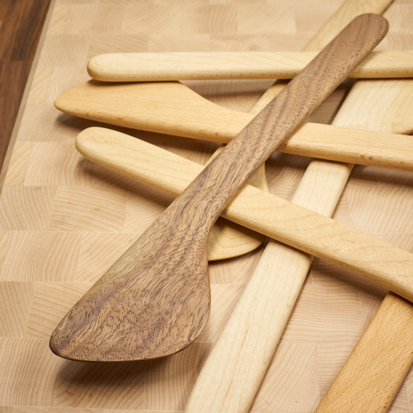 Handmade Walnut Cooking Spatula with a collection of other Spatulas